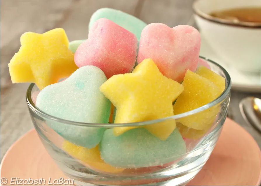 Homemade sugar cubes in heart and star shapes.