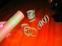 cut spirals from colored cardboard tube