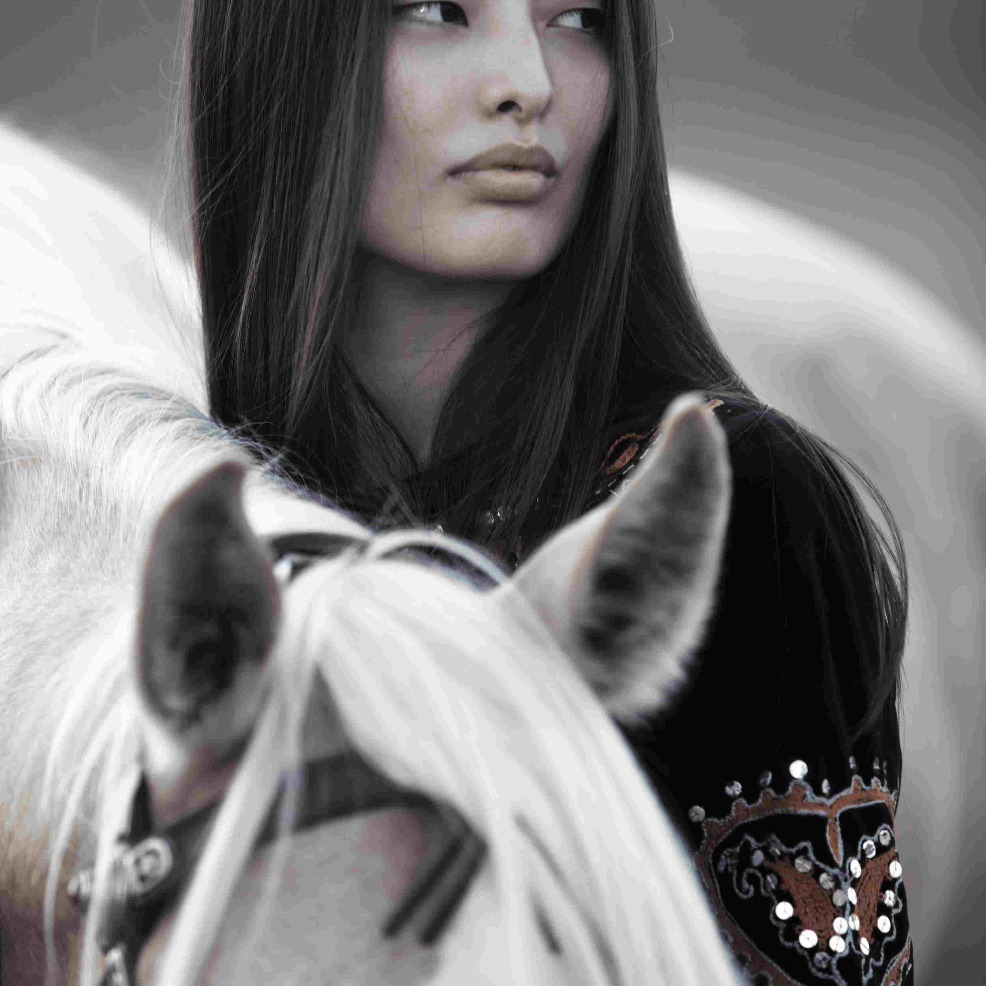 Brunette woman with horse