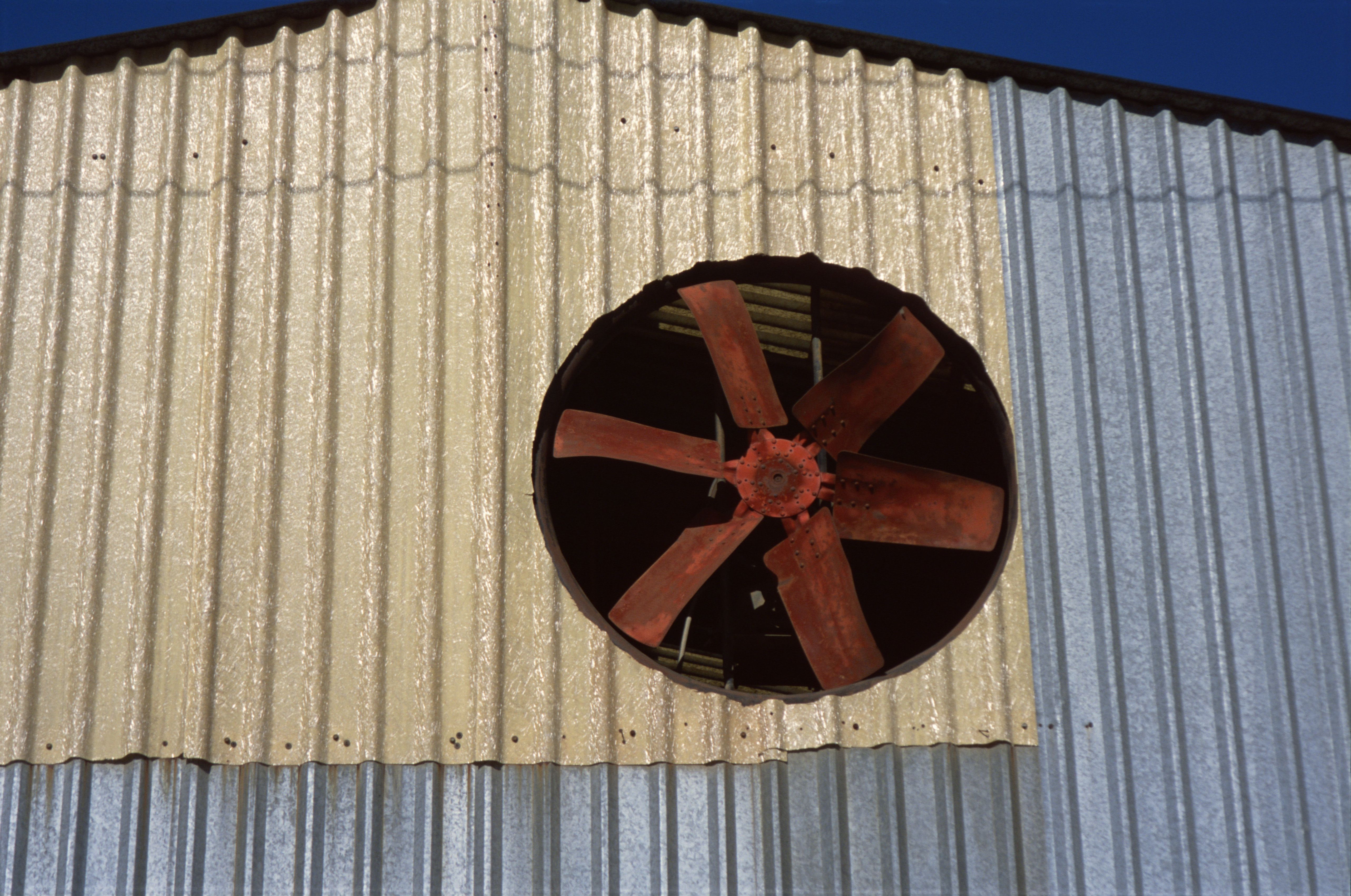 Ventilation fan in metal barn